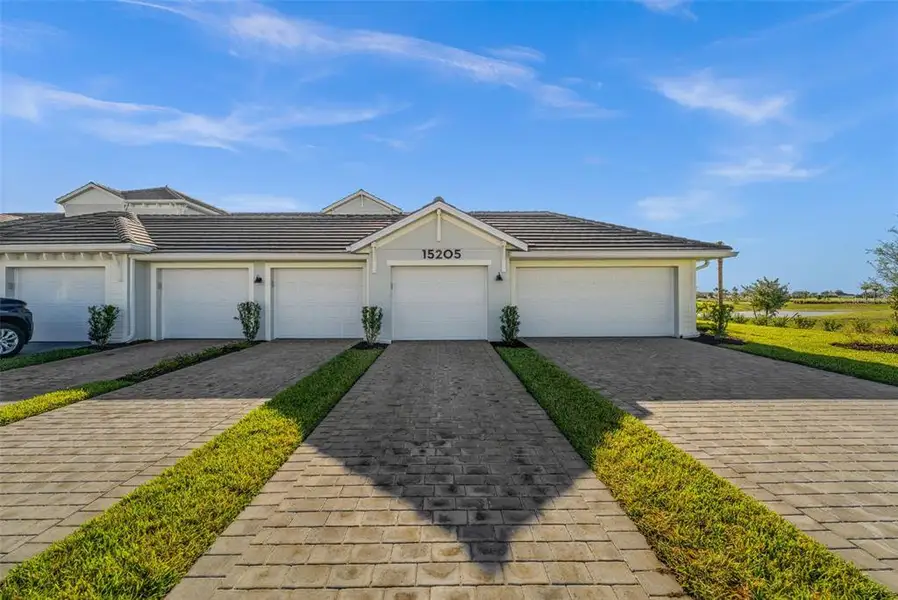 Front exterior of a new home in , Punta Gorda, FL, highlighting curb appeal (Image 20).