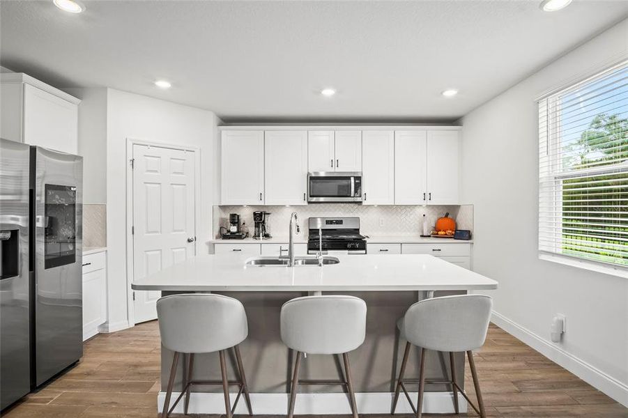 Furnished interior view inside a new home in The Reserve at Twin Lakes, St. Cloud (Image 6).