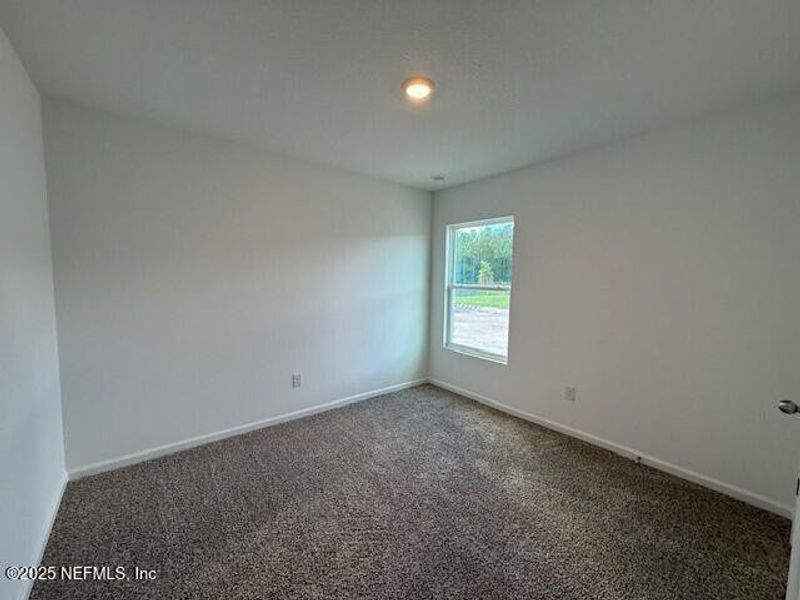 Spacious, unfurnished interior of a new home in Grand Reserve, Bunnell (Image 36).