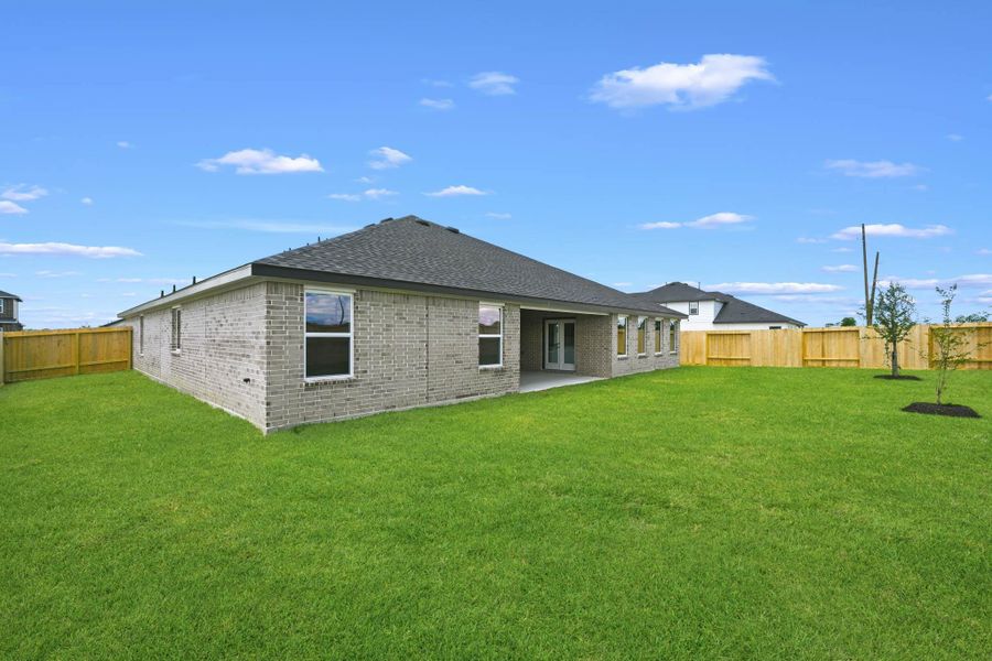 Exterior details and patio area of a home in Riverside Estates, Mont Belvieu (Image 23). Exterior details and patio area of a home in Riverside Estates, Mont Belvieu (Image 23).