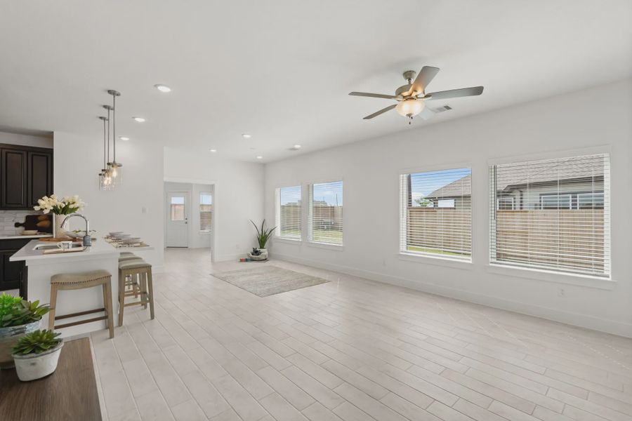 Representative furnished interior of a home built from the Chalet by Chesmar Homes in Meridiana Townhomes, Iowa Colony (Image 11).