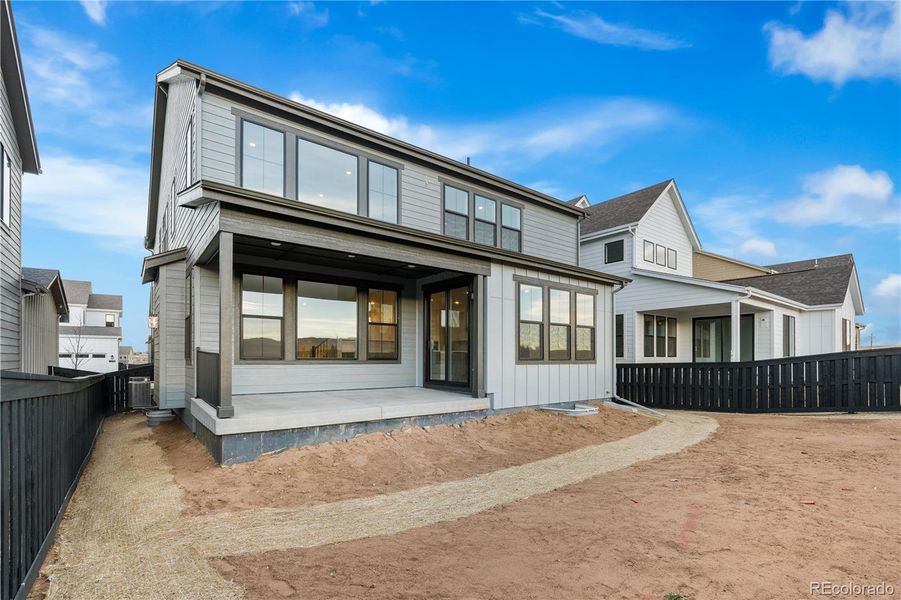 Exterior details and patio area of a home in Stargaze at Solstice, Littleton (Image 31).