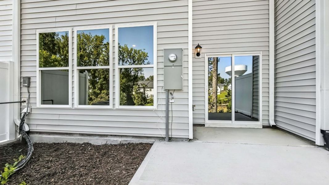 Exterior details and patio area of a home in Chapel Townes, Raleigh (Image 21). Exterior details and patio area of a home in Chapel Townes, Raleigh (Image 21).
