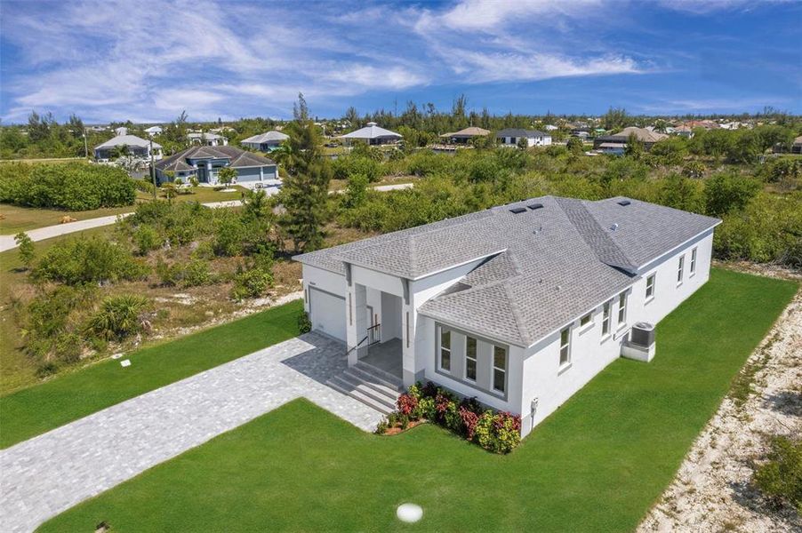 Front exterior of a new home in , Port Charlotte, FL, highlighting curb appeal (Image 31).