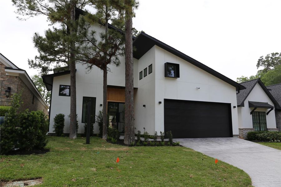 Front exterior of a new home in , Montgomery, TX, highlighting curb appeal (Image 30).