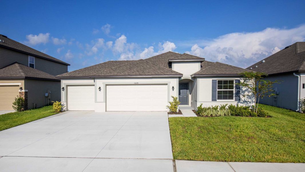 Representative exterior photo of a completed home built from the Miramar by Maronda Homes in Cape Coral, Cape Coral, FL (Image 18).
