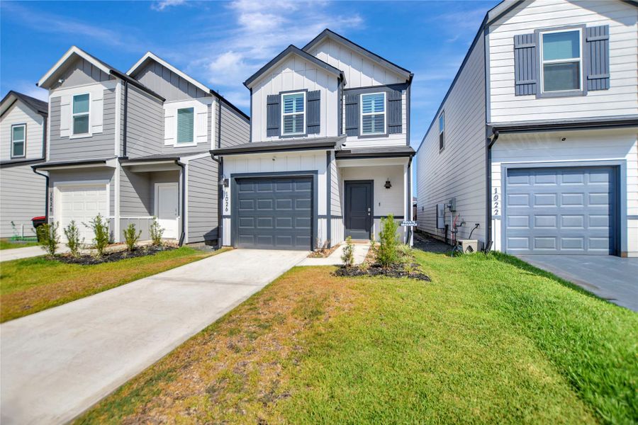 Front exterior of a new home in Legacy Park, Houston, TX, highlighting curb appeal (Image 20).