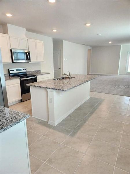 Furnished interior view inside a new home in , Kissimmee (Image 3). Furnished interior view inside a new home in , Kissimmee (Image 3).