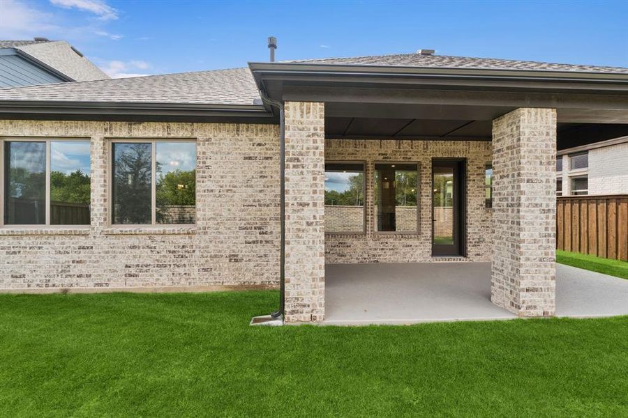 Exterior details and patio area of a home in South Pointe Cottage Series, Mansfield (Image 2). Exterior details and patio area of a home in South Pointe Cottage Series, Mansfield (Image 2).