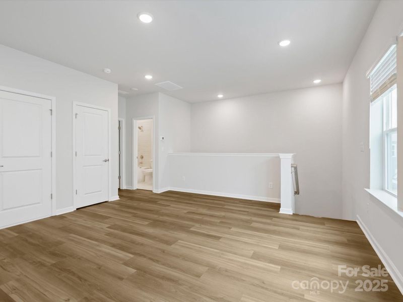 Spacious, unfurnished interior of a new home in Encore at Streamside - Classic Series, Waxhaw (Image 32).