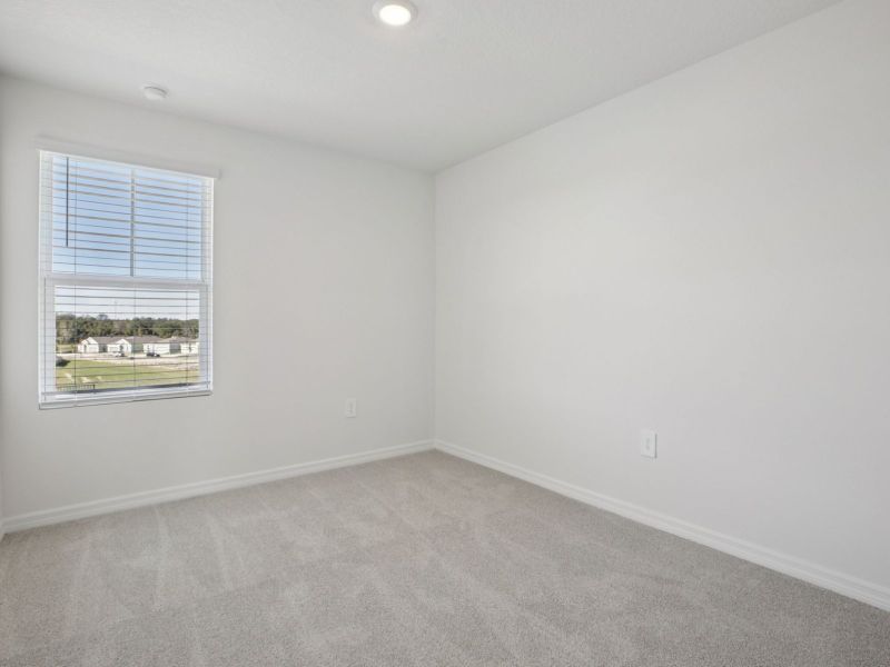 Spacious, unfurnished interior of a new home in Cagan Crossings West, Clermont (Image 10).