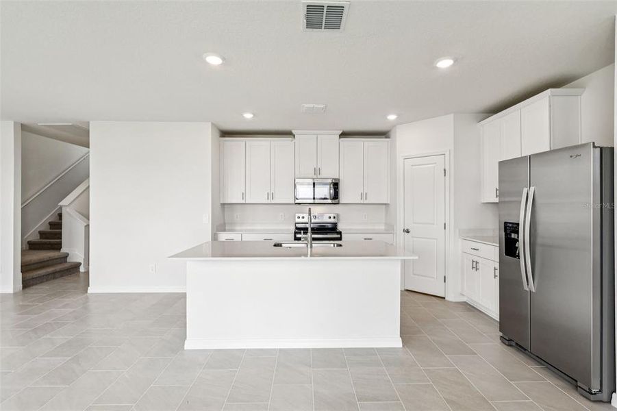 Furnished interior view inside a new home in Crosswinds - Classic Series, Haines City (Image 9). Furnished interior view inside a new home in Crosswinds - Classic Series, Haines City (Image 9).