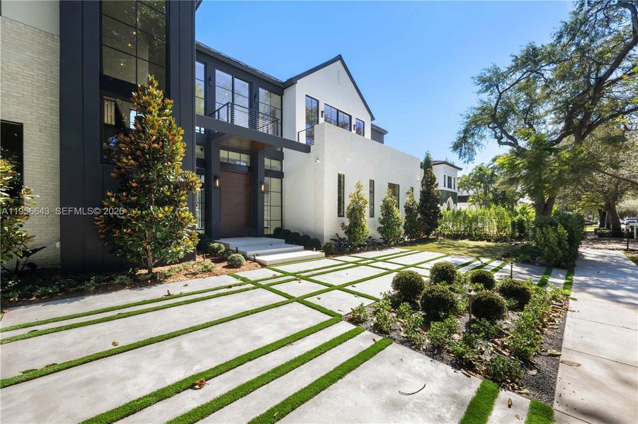 Front exterior of a new home in , Miami, FL, highlighting curb appeal (Image 2). Front exterior of a new home in , Miami, FL, highlighting curb appeal (Image 2).