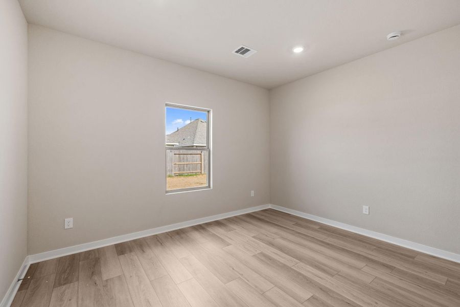 Spacious, unfurnished interior of a new home in Windrose Green 50', Angleton (Image 25).