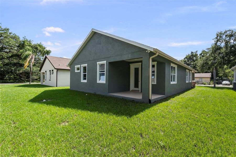 Front exterior of a new home in , Tampa, FL, highlighting curb appeal (Image 20). Front exterior of a new home in , Tampa, FL, highlighting curb appeal (Image 20).