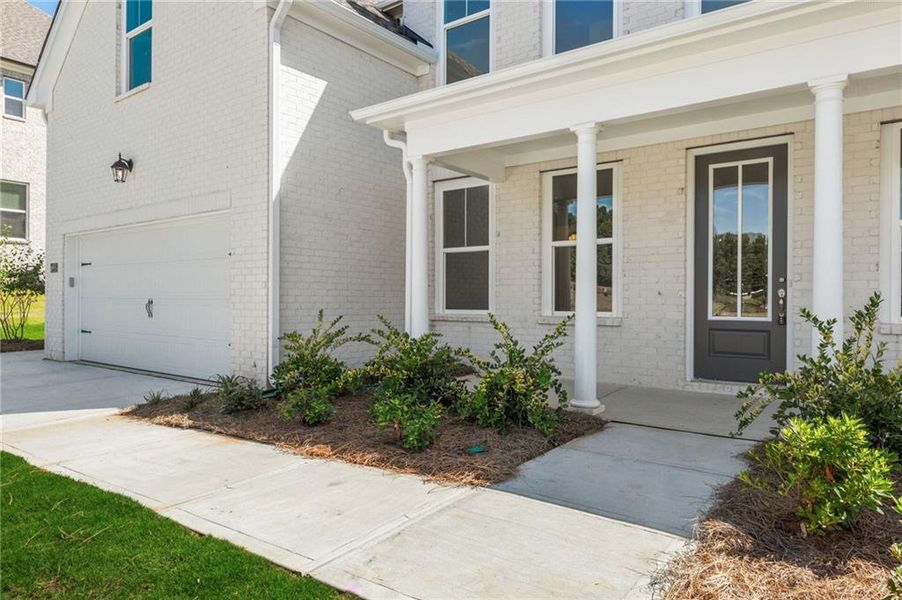 Exterior details and patio area of a home in Melody Lakeside Estates, Buford (Image 2). Exterior details and patio area of a home in Melody Lakeside Estates, Buford (Image 2).