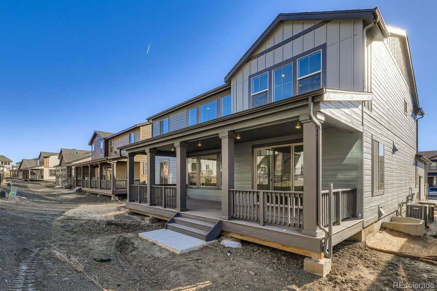 Exterior details and patio area of a home in Red Rocks Ranch: The Grand Collection, Morrison (Image 2).