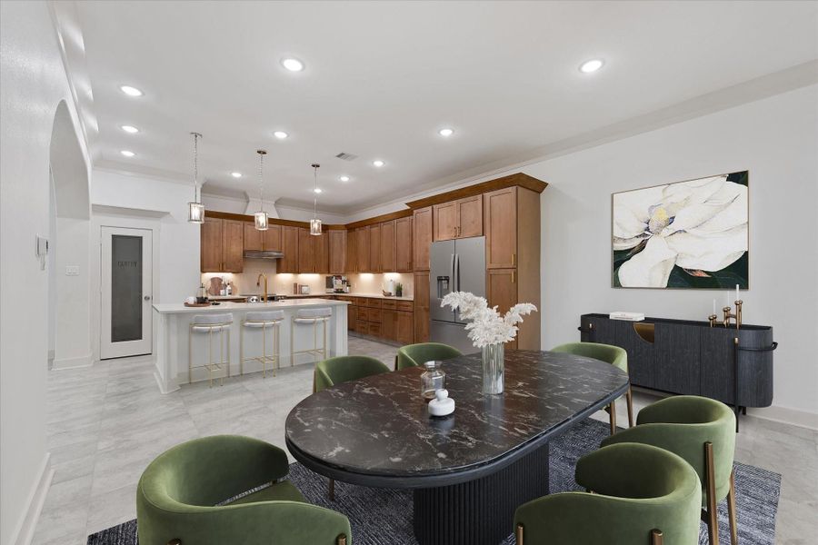 Virtually staged dining area. Virtually staged dining area.