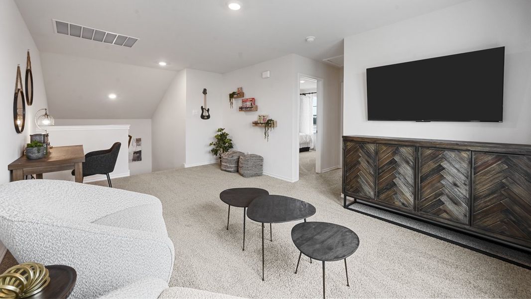 Representative furnished interior of a home built from the Midland by D.R. Horton in Whitewing Trails, Princeton (Image 16).