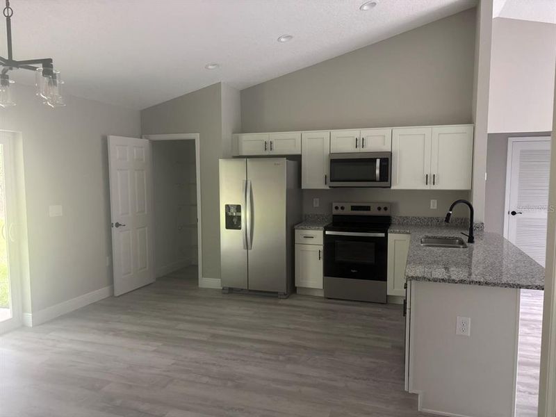 Furnished interior view inside a new home in , Dunnellon (Image 6).