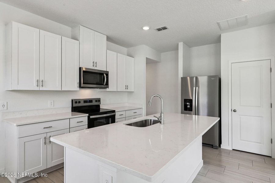 Furnished interior view inside a new home in Kings Preserve, Jacksonville (Image 10). Furnished interior view inside a new home in Kings Preserve, Jacksonville (Image 10).