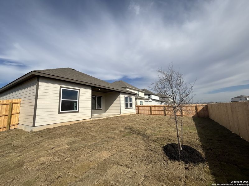 Exterior details and patio area of a home in The Heights at Saddlebrook Ranch 60's, Schertz (Image 15).