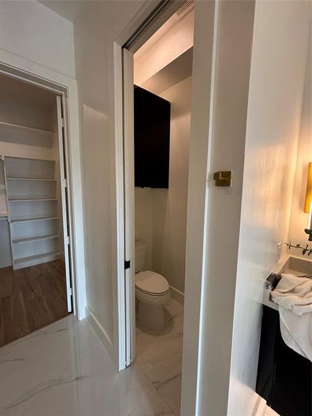 Bathroom with vanity and toilet