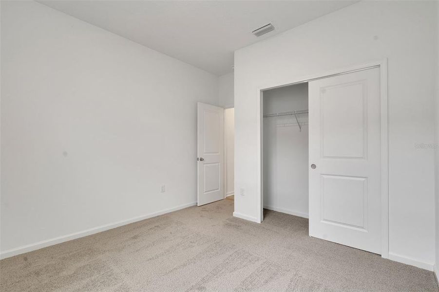 Spacious, unfurnished interior of a new home in Annabelle Estates, Winter Haven (Image 16). Spacious, unfurnished interior of a new home in Annabelle Estates, Winter Haven (Image 16).