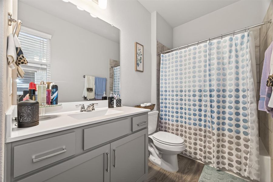 Even the secondary bathrooms are finished to a high standard, offering a clean, relaxing feel for guests or household members.