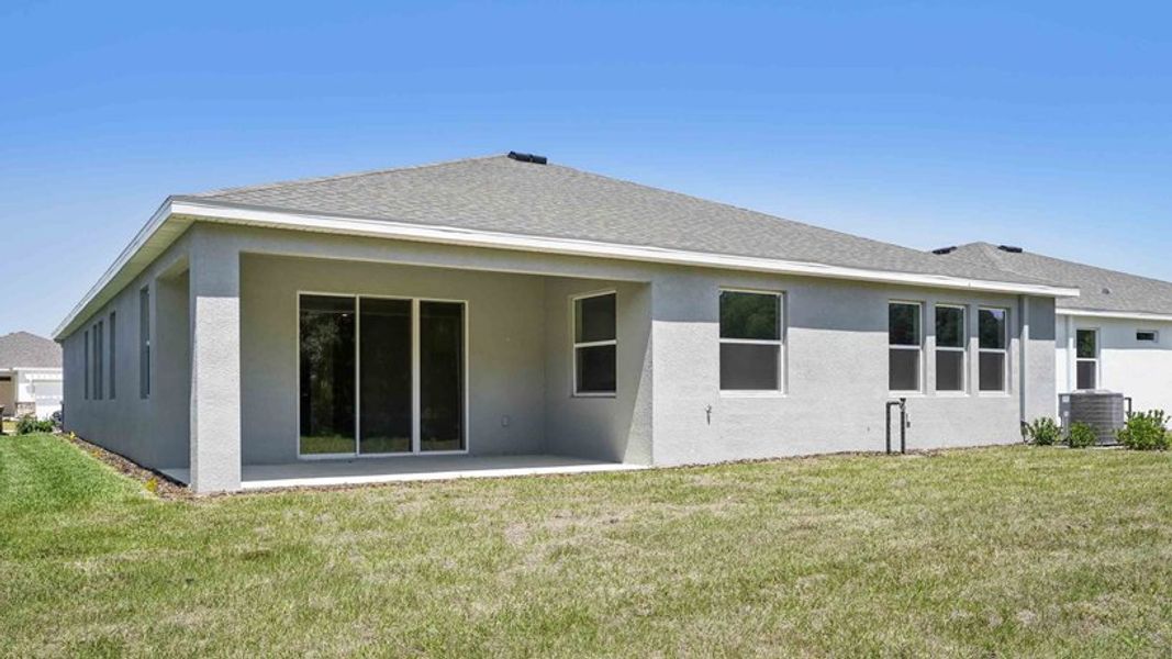 Representative exterior photo of a completed home built from the Camden by D.R. Horton in Twisted Oaks, Wildwood, FL (Image 2). Representative exterior photo of a completed home built from the Camden by D.R. Horton in Twisted Oaks, Wildwood, FL (Image 2).