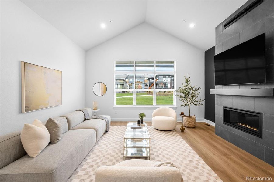 Soaring vaulted ceilings and rare park views from main living space