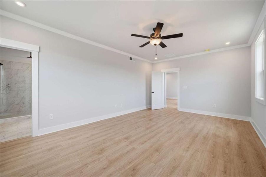 Spacious, unfurnished interior of a new home in The Paddocks at Doc Hughes, Buford (Image 18).