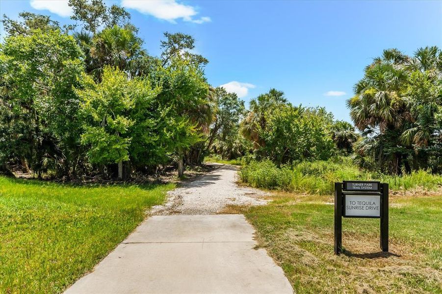 Front exterior of a new home in , Sarasota, FL, highlighting curb appeal (Image 27).