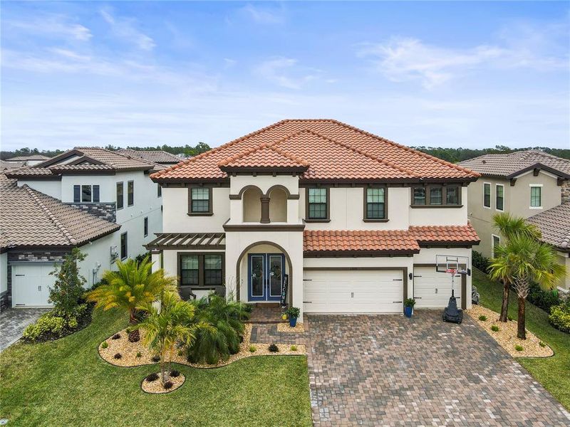Front exterior of a new home in , Parrish, FL, highlighting curb appeal (Image 19).