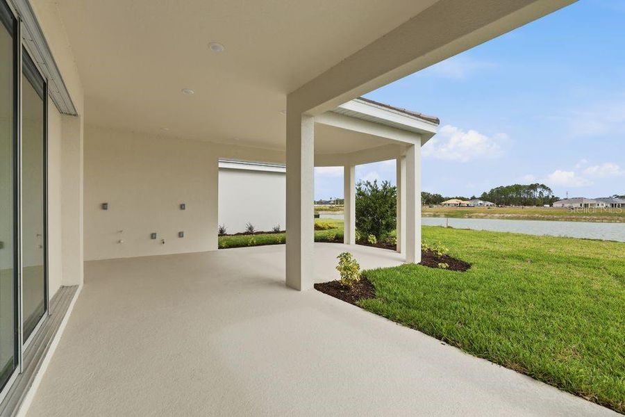 Exterior details and patio area of a home in Esplanade at Wiregrass Ranch, Wesley Chapel (Image 3).