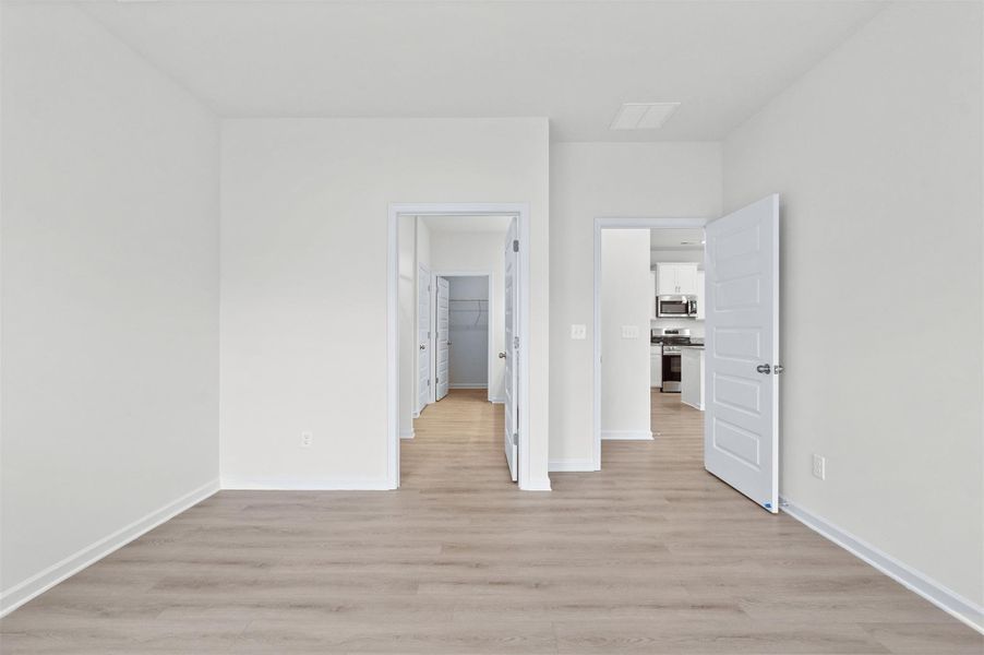 The Dove- Primary Suite. Home under construction, photo used for illustrative purposes only, colors and options will vary.