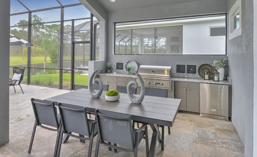 Exterior details and patio area of a home in Plantation Bay, Ormond Beach (Image 22).