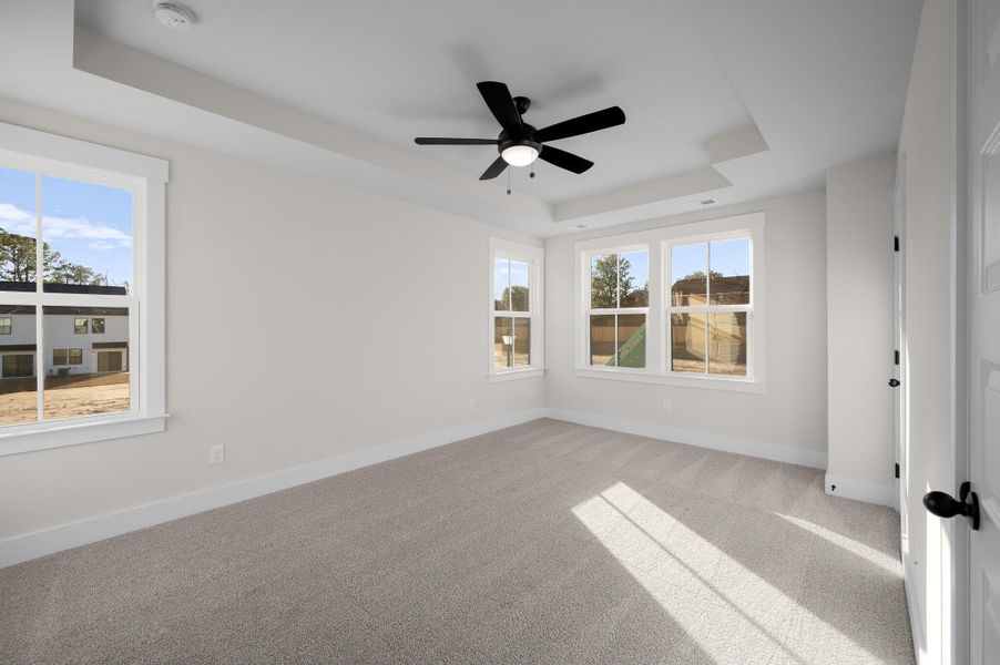 Photo is of a similar home