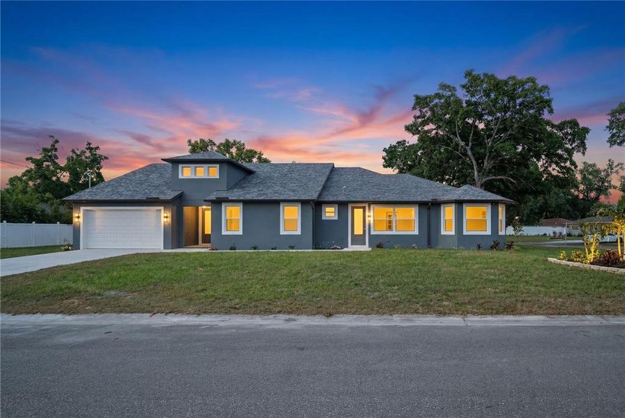 Front exterior of a new home in , Tampa, FL, highlighting curb appeal (Image 21).