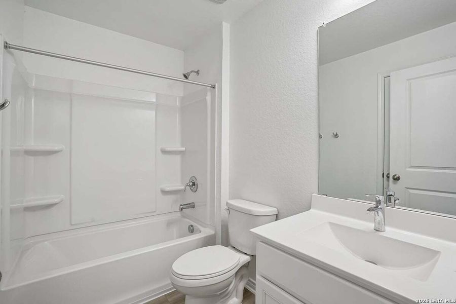Furnished interior view inside a new home in Southton Cove, Elmendorf (Image 7).