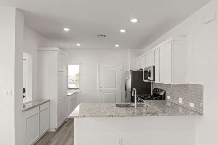Representative furnished interior of a home built from the Frisco by Pacesetter Homes in Blanco Vista, San Marcos (Image 7).