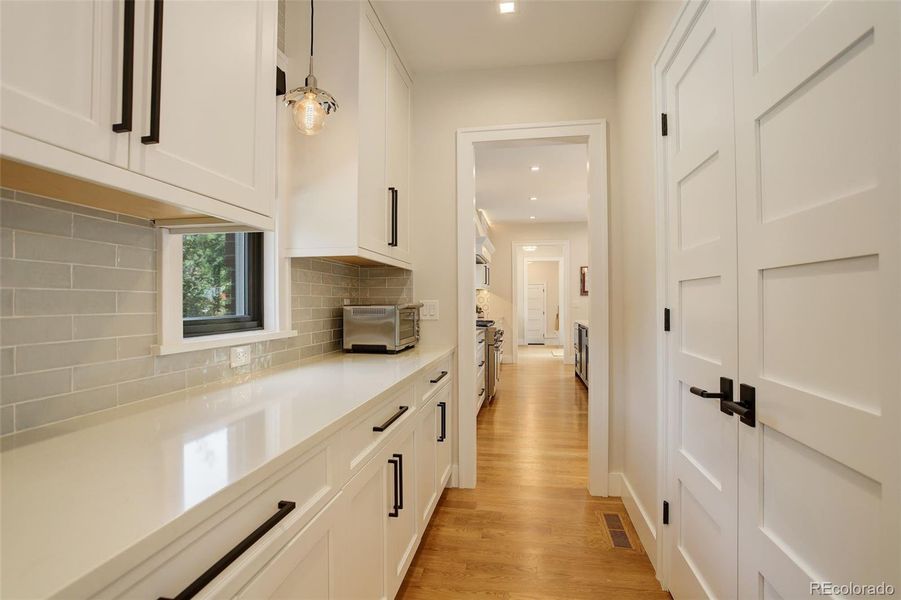 Butler's Pantry and Pantry connecting Formal Dining to the Kitchen