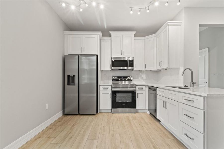 Furnished interior view inside a new home in , Apopka (Image 6).
