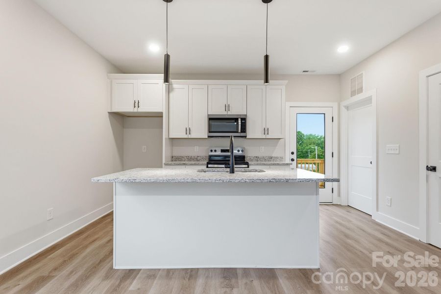 Furnished interior view inside a new home in , Albemarle (Image 5).