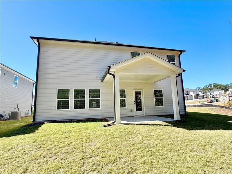 Exterior details and patio area of a home in Vines at Mill Creek - Estate Series, Braselton (Image 3). Exterior details and patio area of a home in Vines at Mill Creek - Estate Series, Braselton (Image 3).