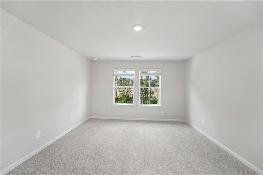 Spacious, unfurnished interior of a new home in Northwoods at Mirror Lake, Villa Rica (Image 36).