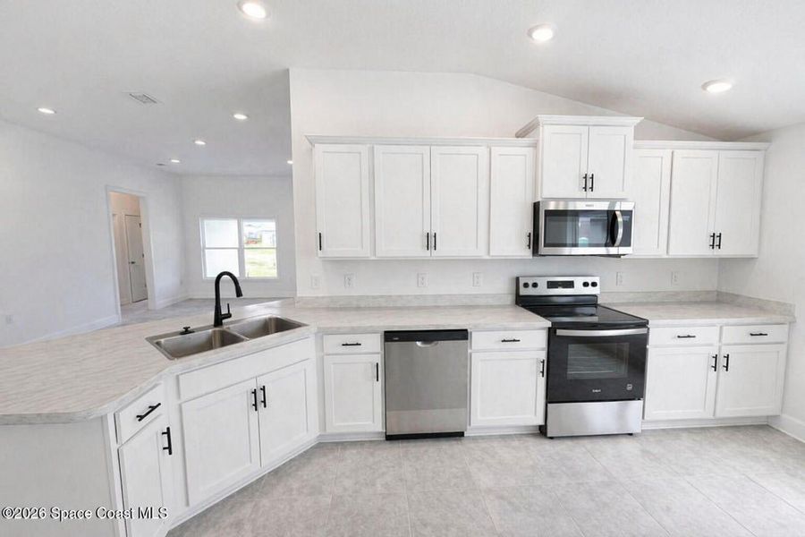 Furnished interior view inside a new home in St. John's Preserve, Palm Bay (Image 3).