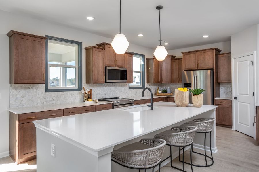 Representative furnished interior of a home built from the Nelson by McKee Homes in Holston, Fuquay Varina (Image 6).