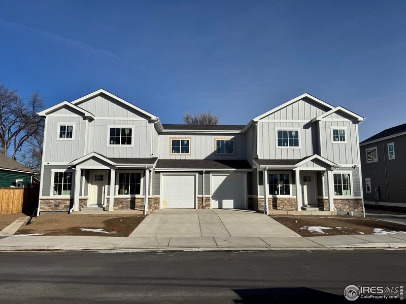 Front exterior of a new home in , Loveland, CO, highlighting curb appeal (Image 3).