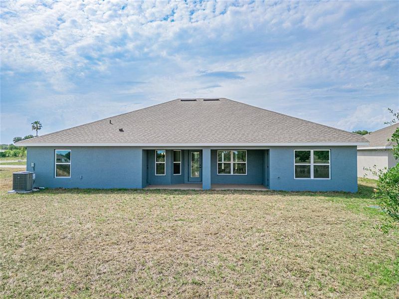 Exterior details and patio area of a home in Hickory Ridge Estates, Lake Wales (Image 20).